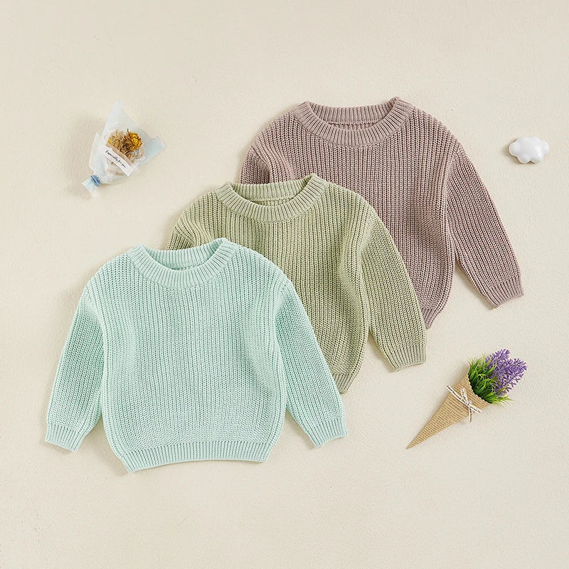 Warm colored knitted sweaters