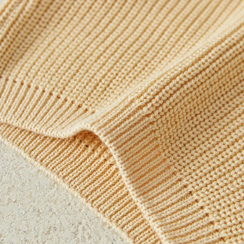 Warm colored knitted sweaters
