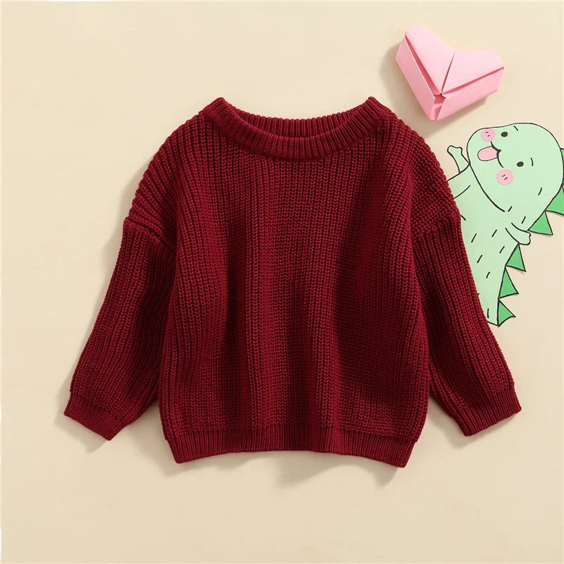 Neutral colored knitted sweaters