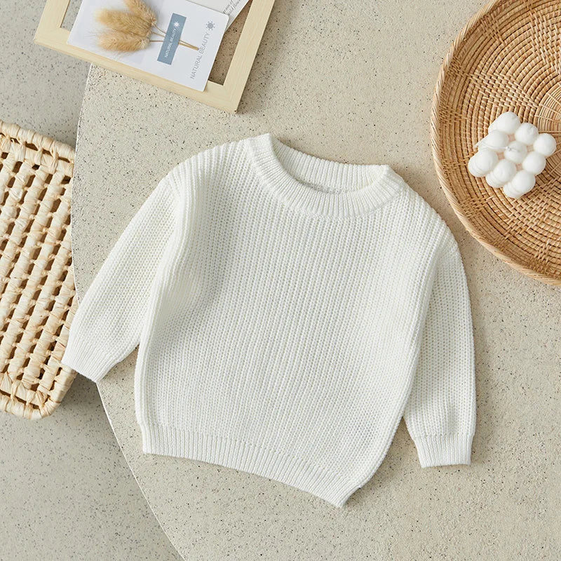 Warm colored knitted sweaters