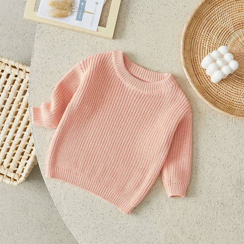 Warm colored knitted sweaters