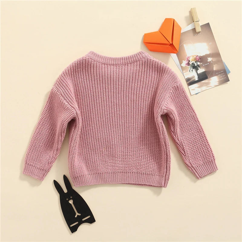 Warm colored knitted sweaters