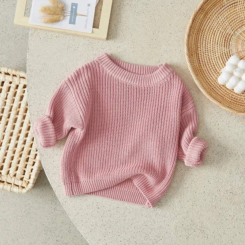 Warm colored knitted sweaters