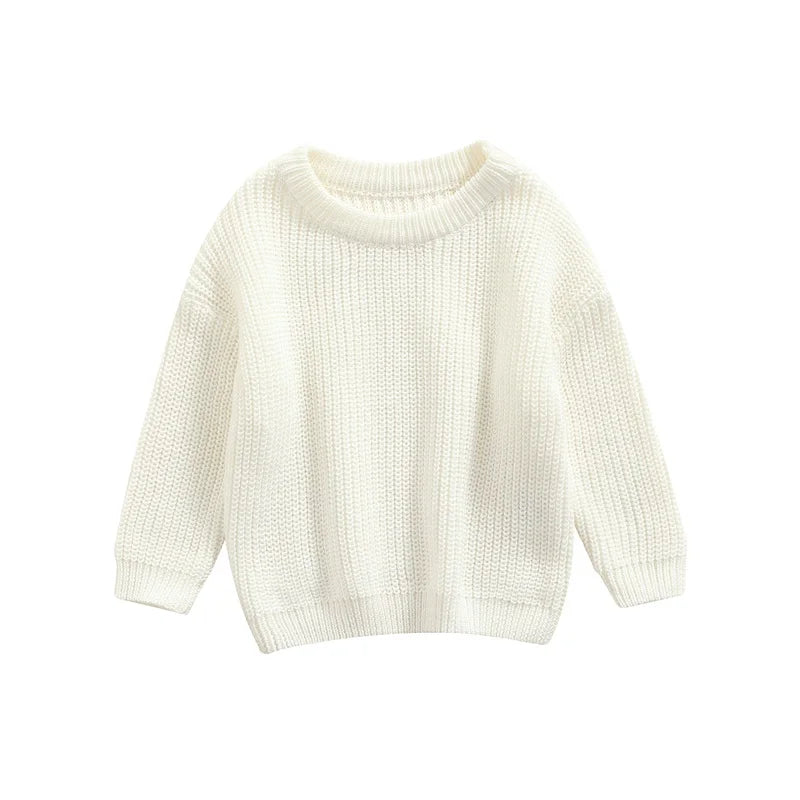 Neutral colored knitted sweaters