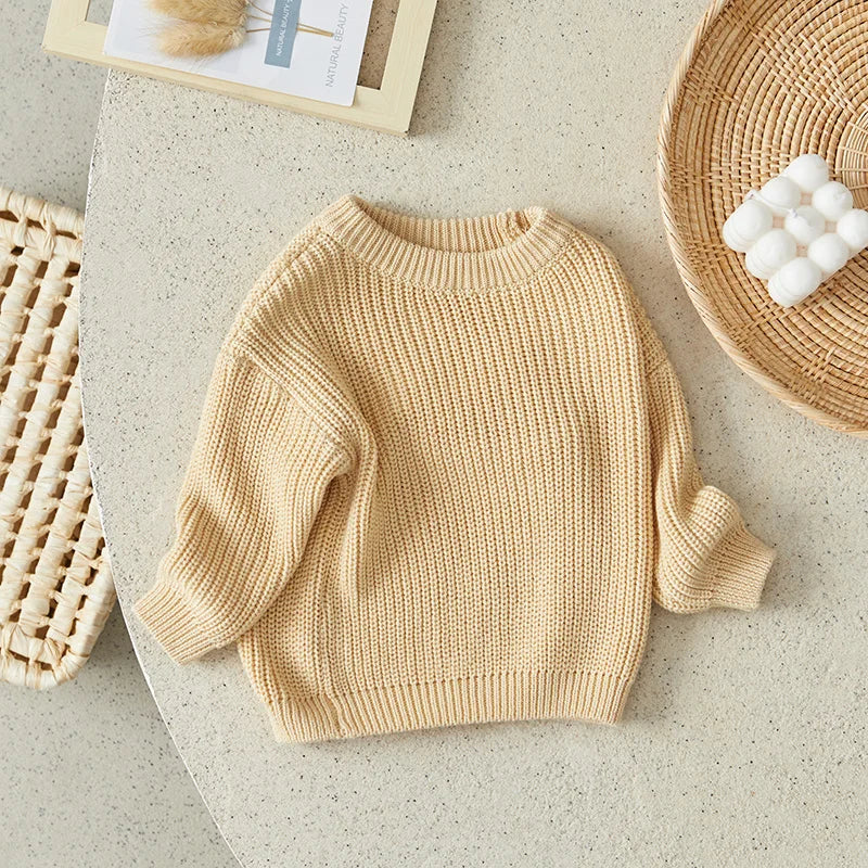 Warm colored knitted sweaters