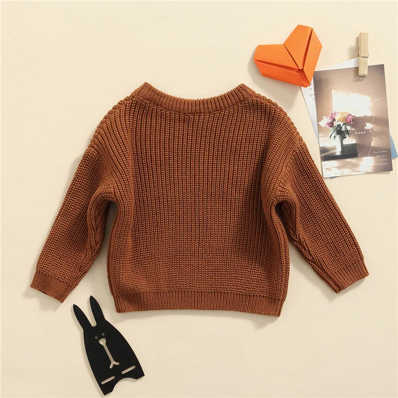 Warm colored knitted sweaters
