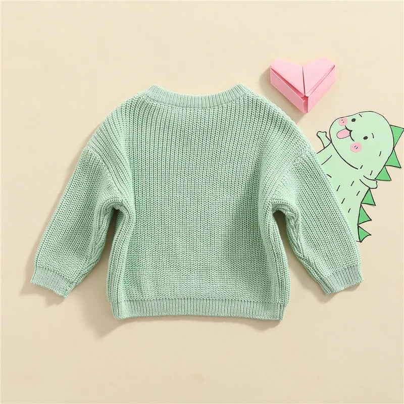 Neutral colored knitted sweaters