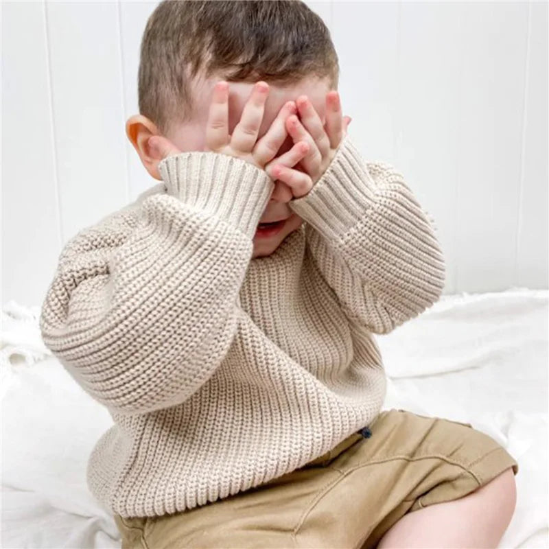 Warm colored knitted sweaters