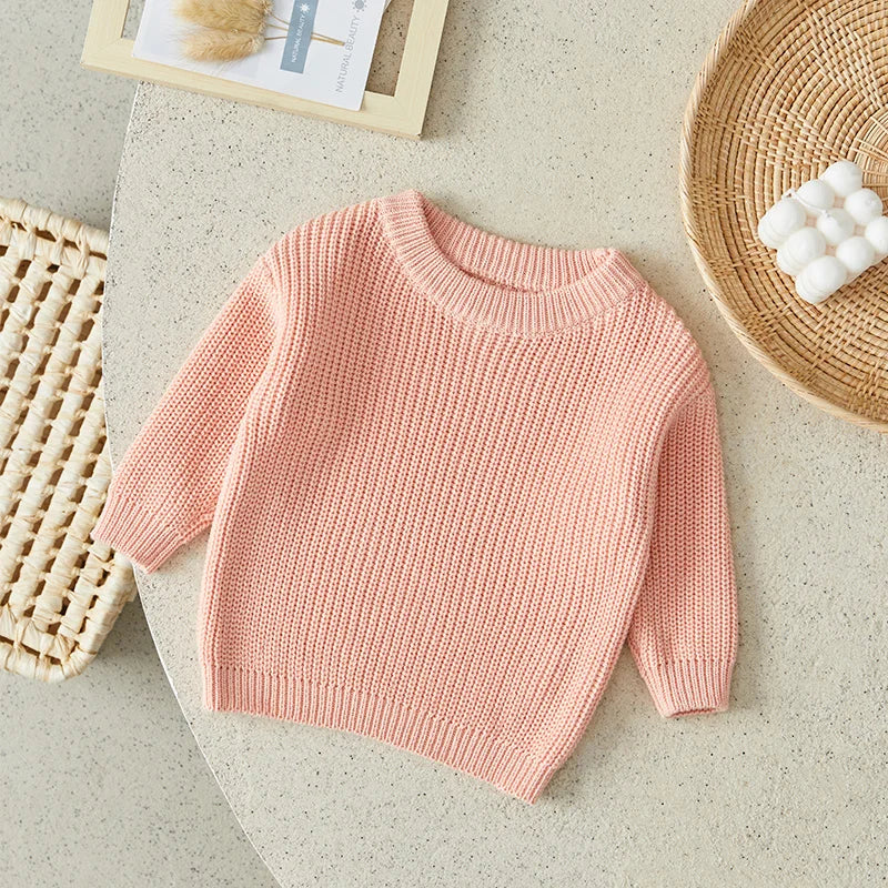 Warm colored knitted sweaters