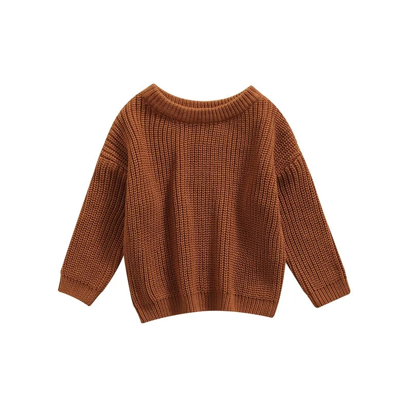 Neutral colored knitted sweaters