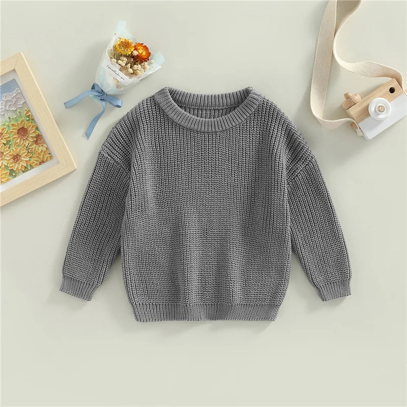 Warm colored knitted sweaters