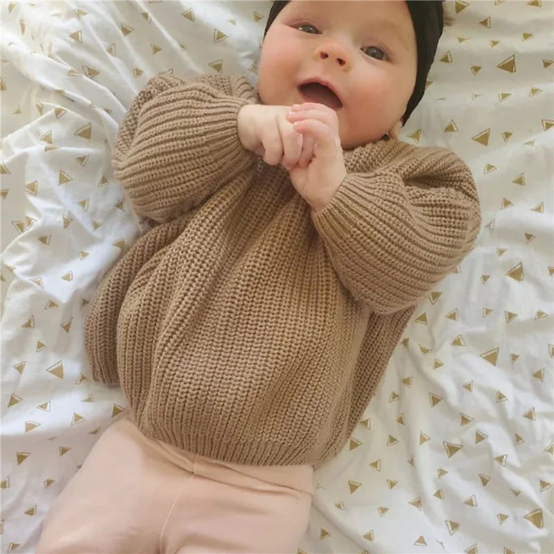 Warm colored knitted sweaters