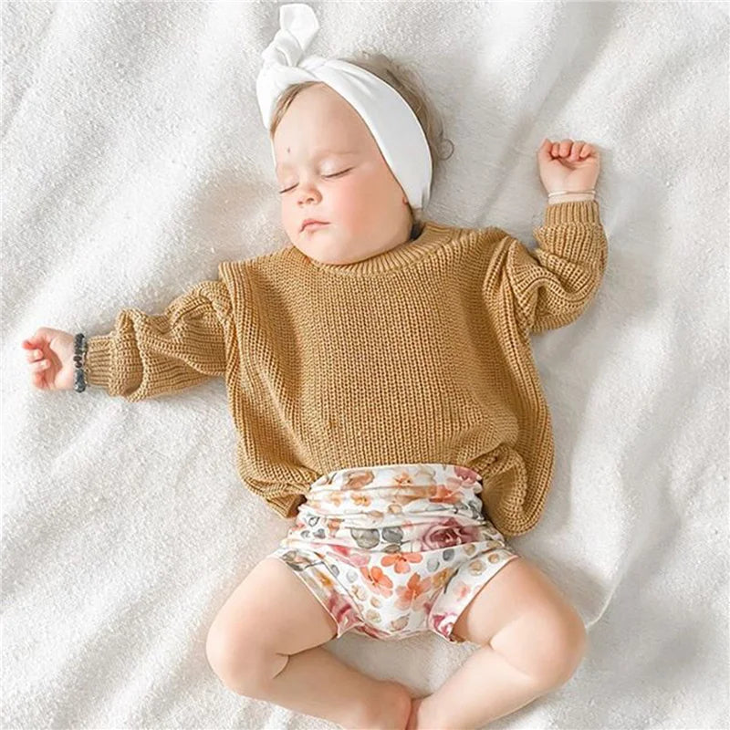 Warm colored knitted sweaters