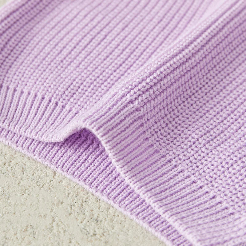 Warm colored knitted sweaters