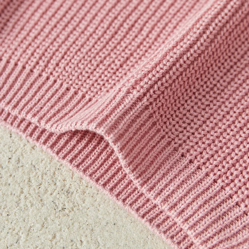 Warm colored knitted sweaters