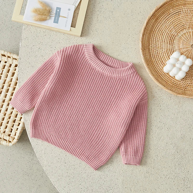 Warm colored knitted sweaters