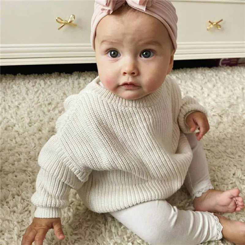 Warm colored knitted sweaters
