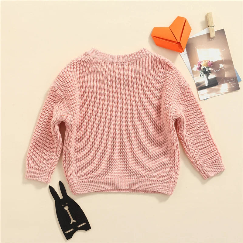 Warm colored knitted sweaters