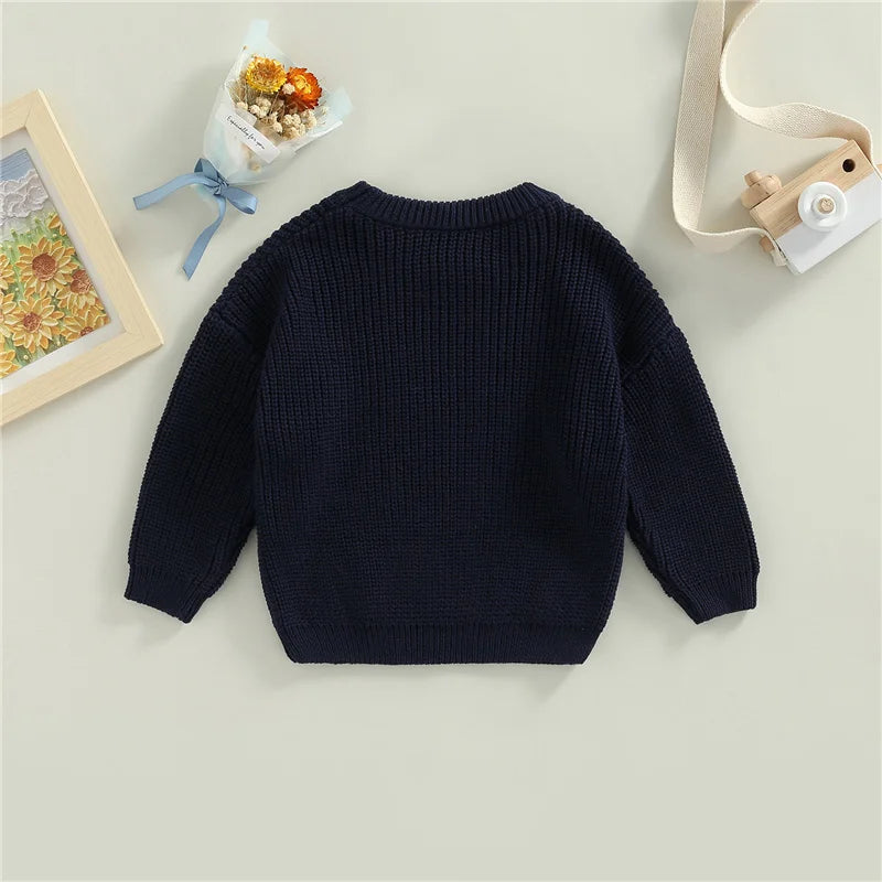 Warm colored knitted sweaters