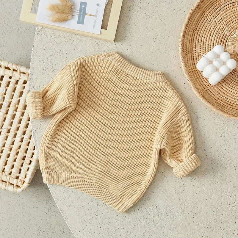 Warm colored knitted sweaters