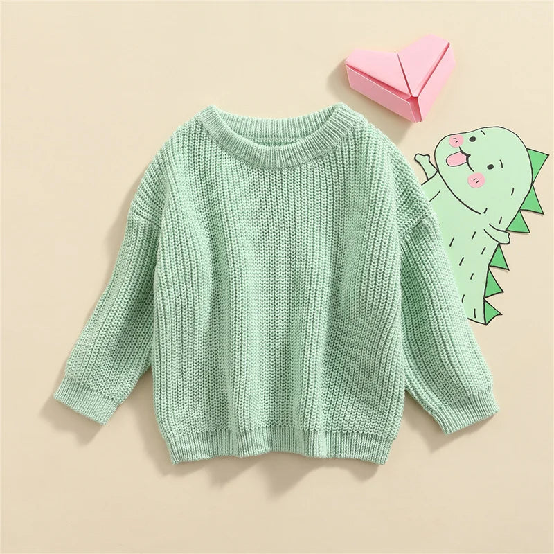 Neutral colored knitted sweaters