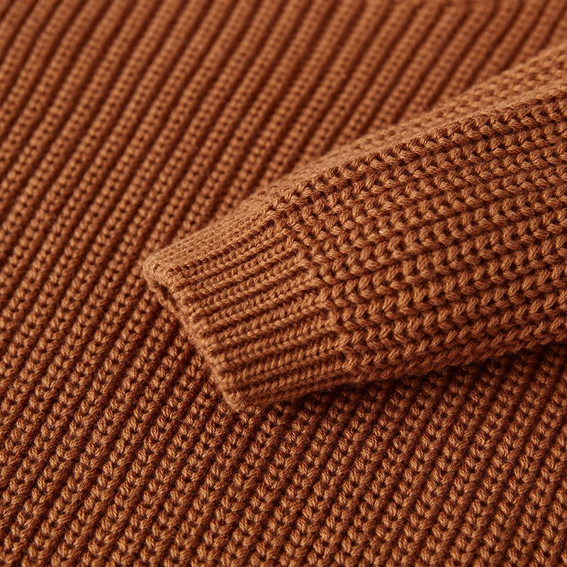 Neutral colored knitted sweaters