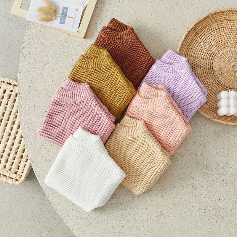Warm colored knitted sweaters