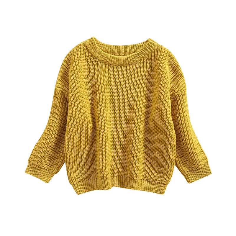 Neutral colored knitted sweaters