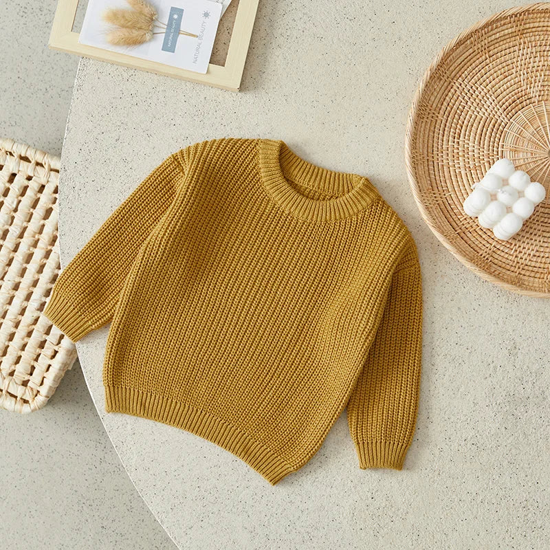 Warm colored knitted sweaters