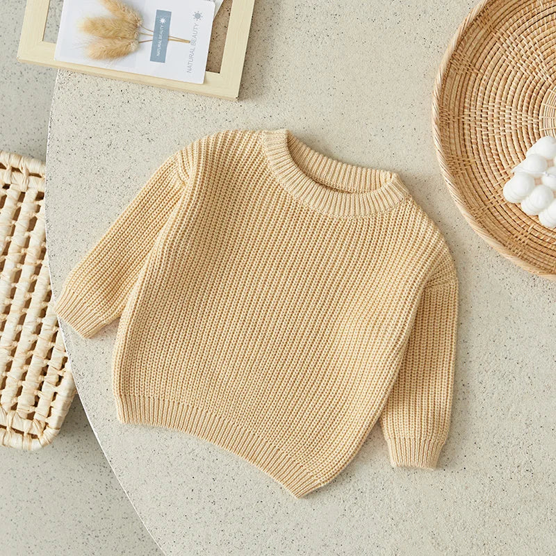 Warm colored knitted sweaters