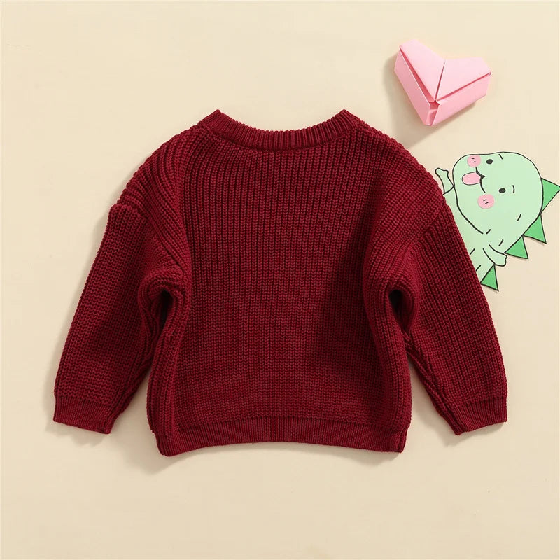 Warm colored knitted sweaters