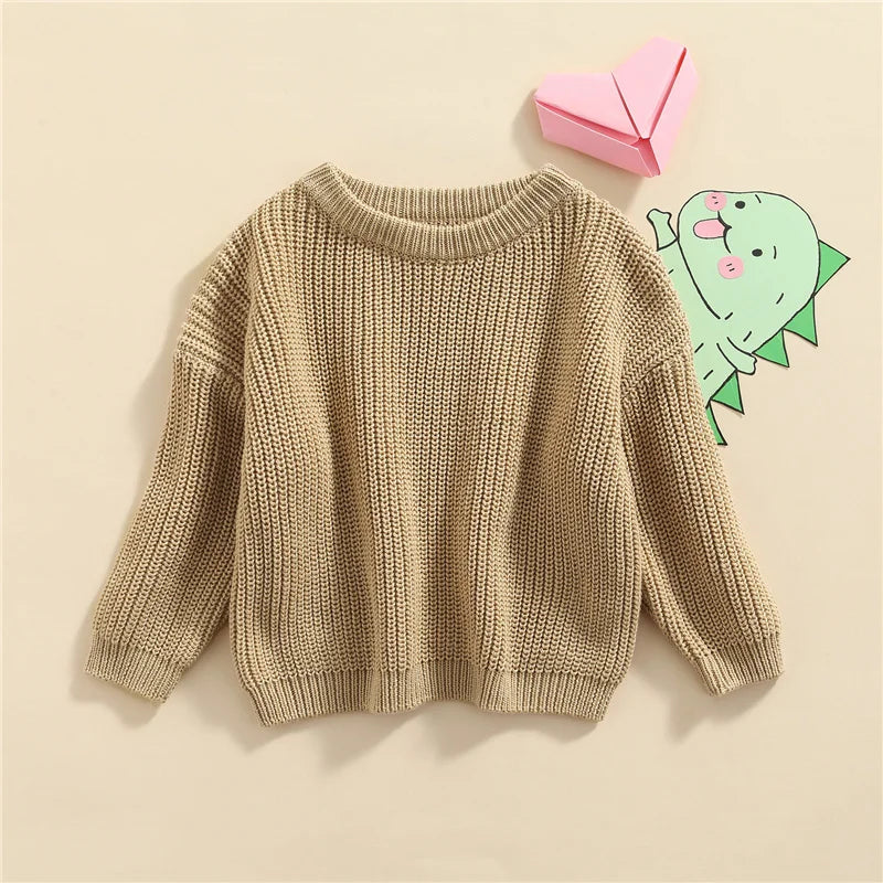 Neutral colored knitted sweaters
