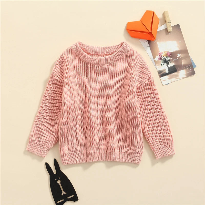 Warm colored knitted sweaters