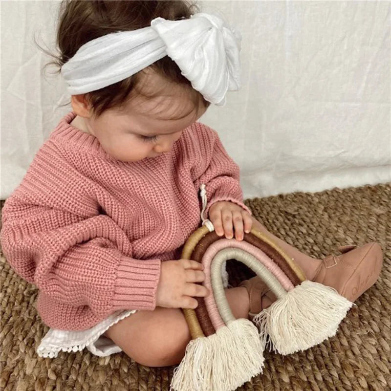 Neutral colored knitted sweaters